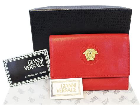 versace tas klein|Versace leather wallet.